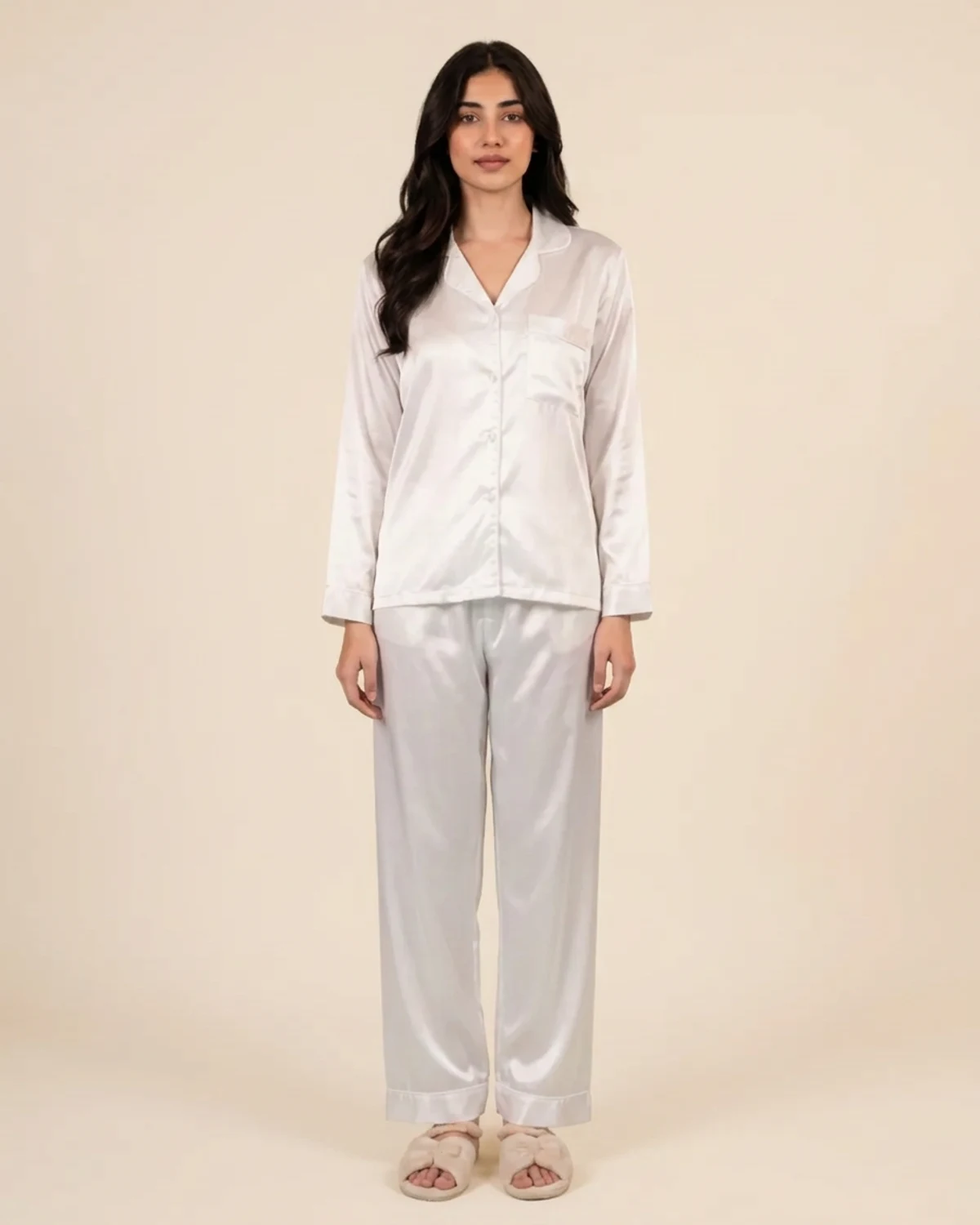 White silk night suit with collared button-down top and baggy trousers